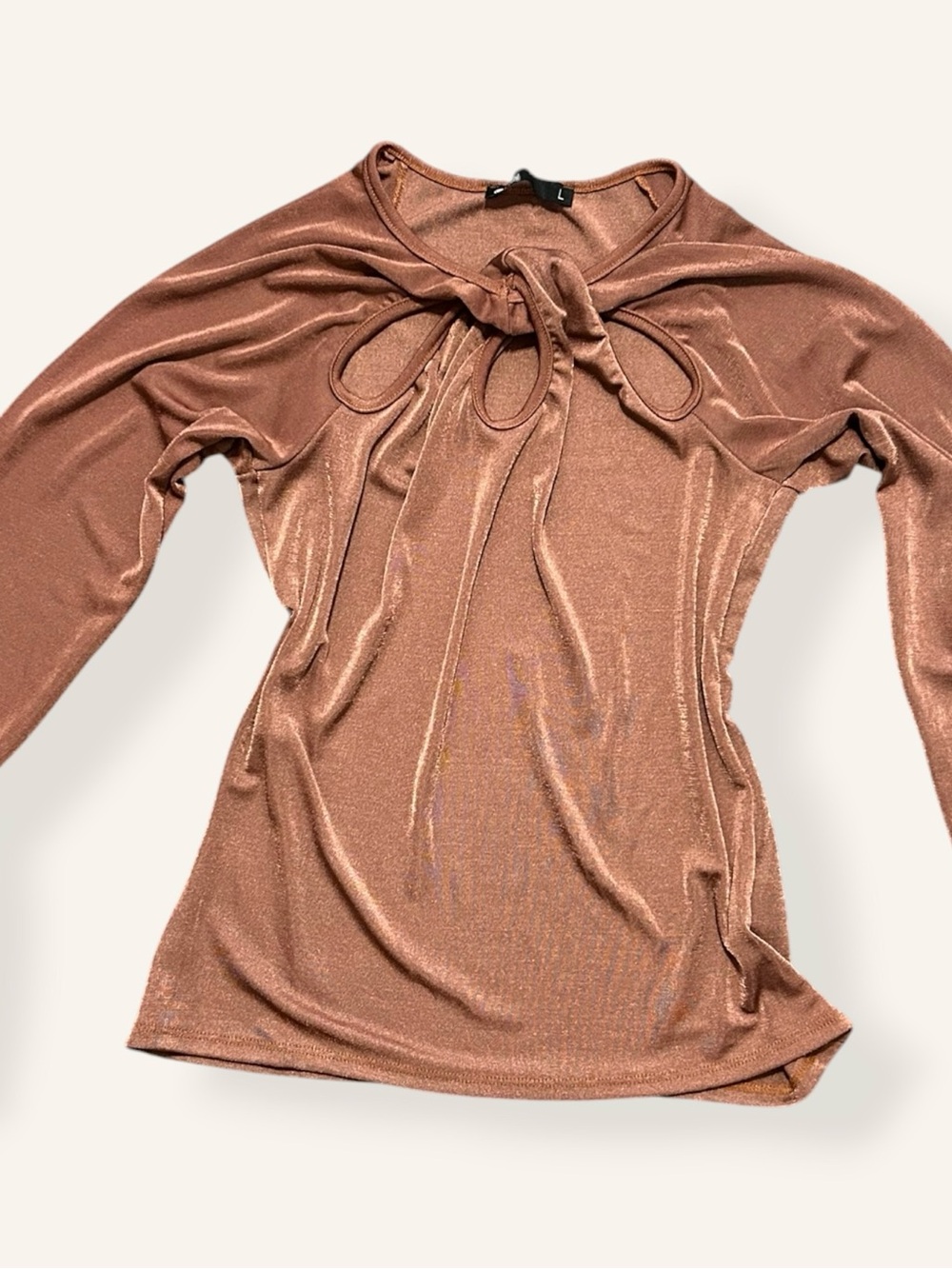 bronze long-sleeved shimmer top featuring gathered knot detail and cut-out neck